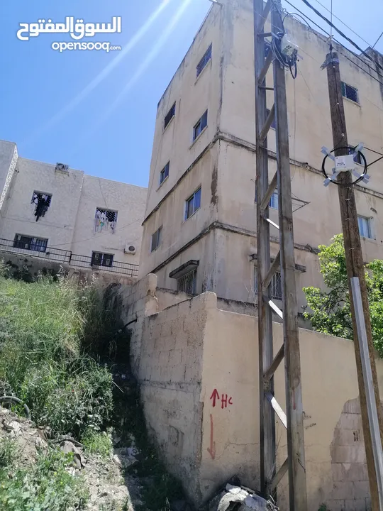 عماره مع ارض للبيع تصلح للاستثمار او اسكان