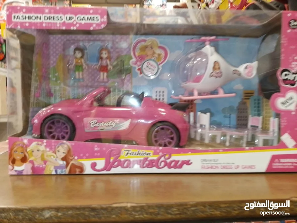 لعبه مع سياره وطياره باربي.
