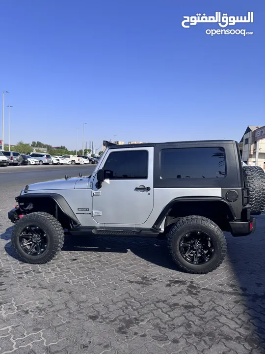 Jeep Wrangler Sport (Equipped) - جيب رانجلر سبورت مجهزة