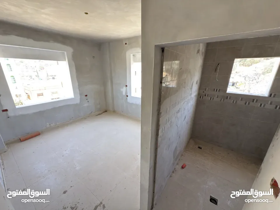 شقة أرضية بإطلالة مفتوحة وتشطيب مؤسس — فرصة لتصميم لمساتك الخاصة!