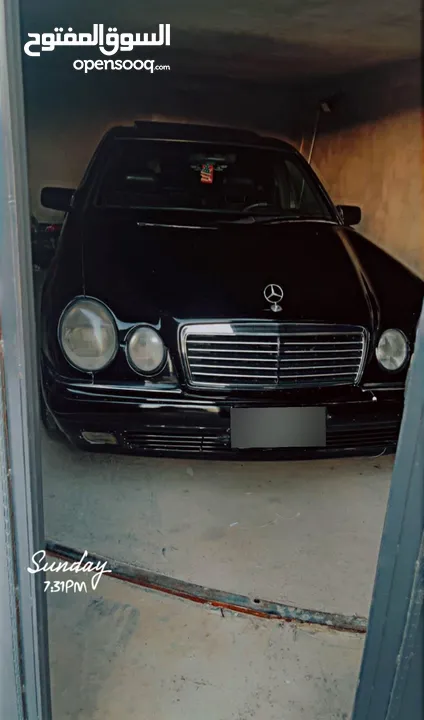 مرسيدس W210