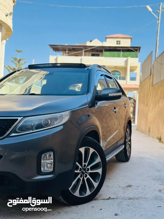 كيا سرنتو 2015ترخيص2014 للبيع المعني حيا الله ترخيص وتأمين هديه سنه الجب بحاله ممتازه  فل الفل الجيب