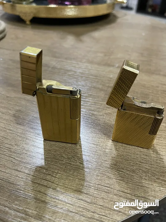 ولاعتين ديبونت ( s t Dupont )صناعه فرنسيه مطلي بالذهب