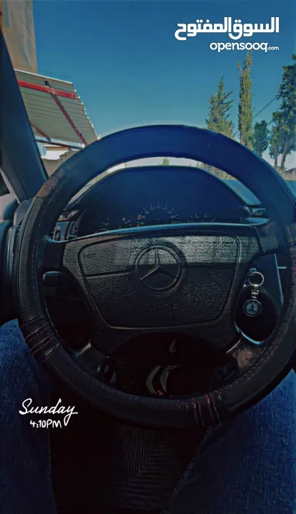 مرسيدس W210