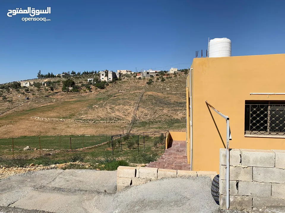 منزل ومزرعة للبيع في منطقة المريجمة-مادبا