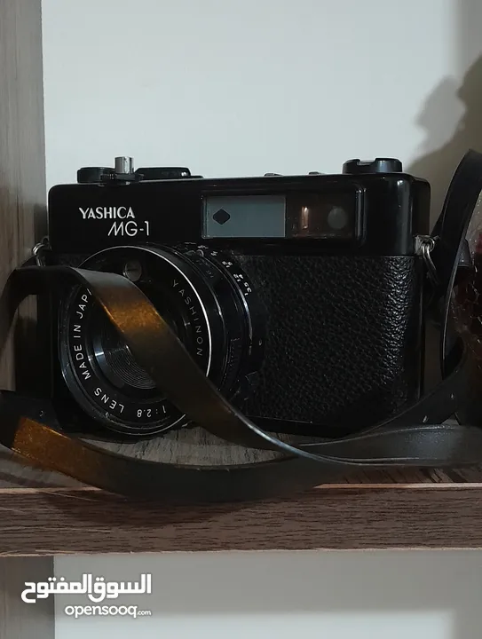 كاميرا فنتيج قديمة Yashica mg-1 جلد باللون الأسود معها حزامها شغالة للبيع   بدون شريط فيلم