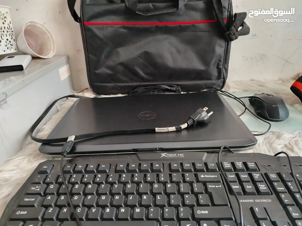 Dell Laptop with x-trike RGB gaming mouse and rainbow gaming keyboard with bag and mouse pad