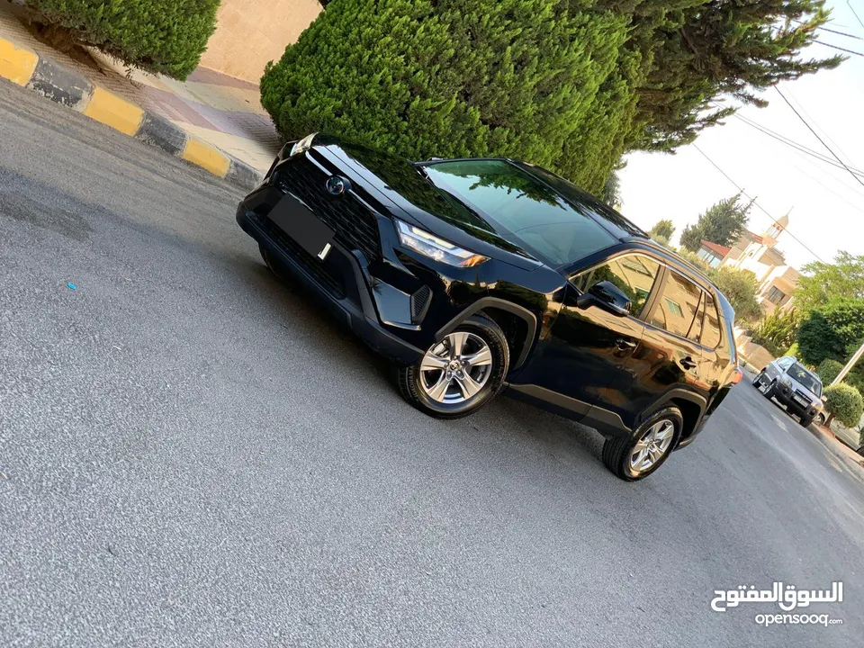 تيوتا رافور هايبرد 2023 xle لون اسود ملوكي جمرك اليوم اعلى صنف