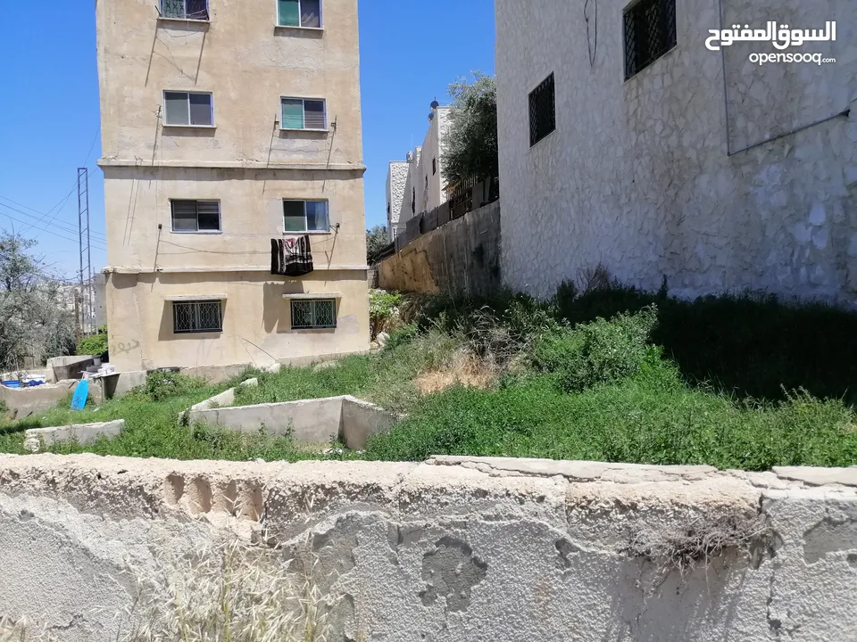 عماره مع ارض للبيع تصلح للاستثمار او اسكان