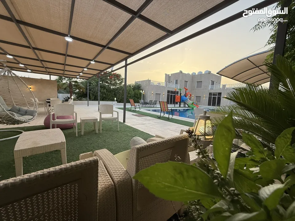 مزرعة نخيل مجهول + شاليه مودرن للبيع