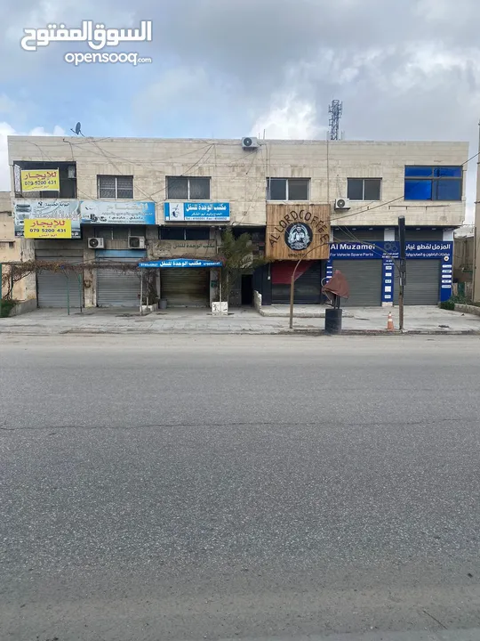 مكتب تجاري لايجار سنوي على الشارع الرئيسي طريق حزام قرب دوار الجمرك