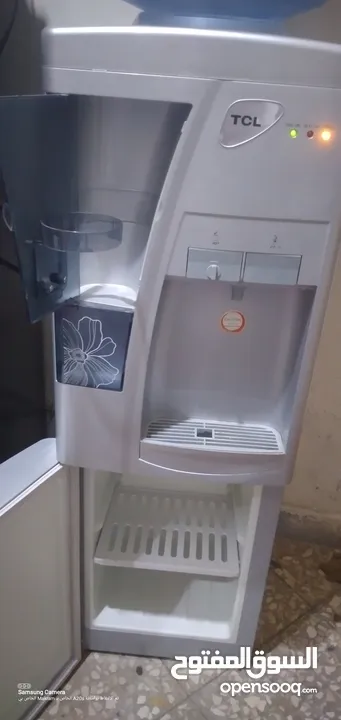كولر مي ديجيتال لون سلفر مع حافظه للكاسات وحافظه سفليه مستعمل خفيف جداكول ممتاذ علي الفحص حامي بارد