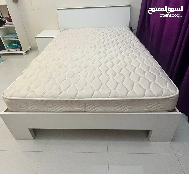 A sturdy and stylish bed with a comfortable, high-quality mattress in excellent condition