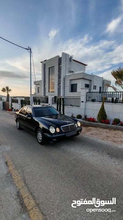 E200. 2002  قرش ونص 2002  رقم الهاتف بالوصف