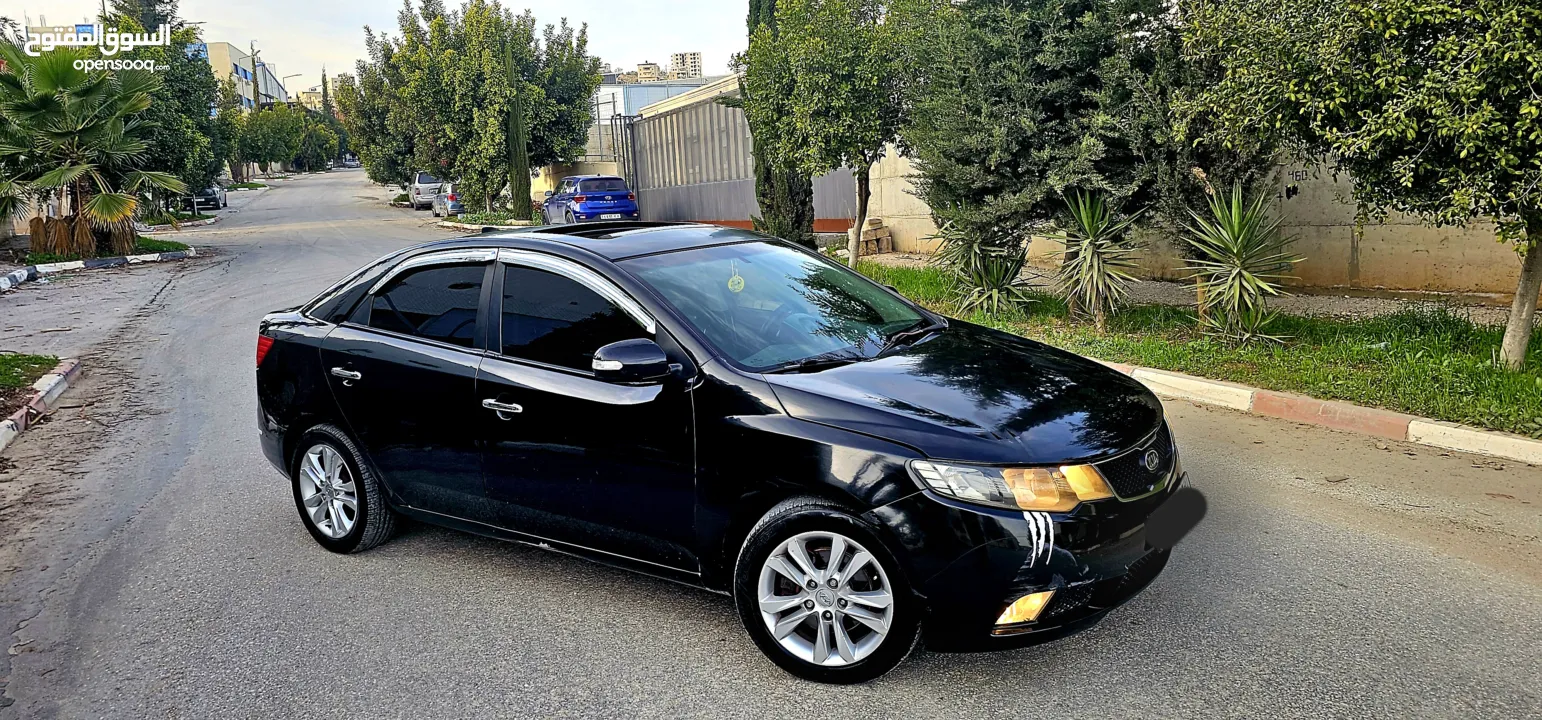 كيا فورتي فل مع فتحه سقف وبصمه 2011 اصل برايفت