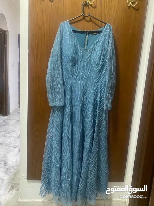 اعلان فستان سهرة ازرق