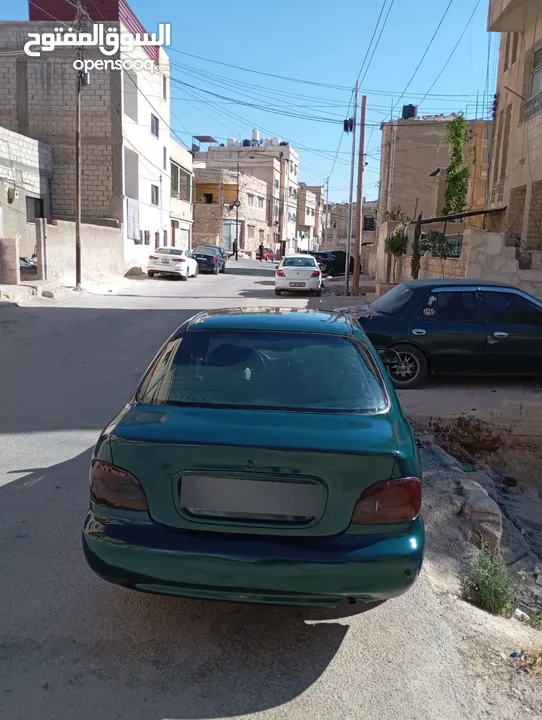 هونداي اكسنت توماتيك اصلي موديل 95 مكيف ثلاجه ترخيص شهر 3/2026 سياره زي ما بالصور واحلى