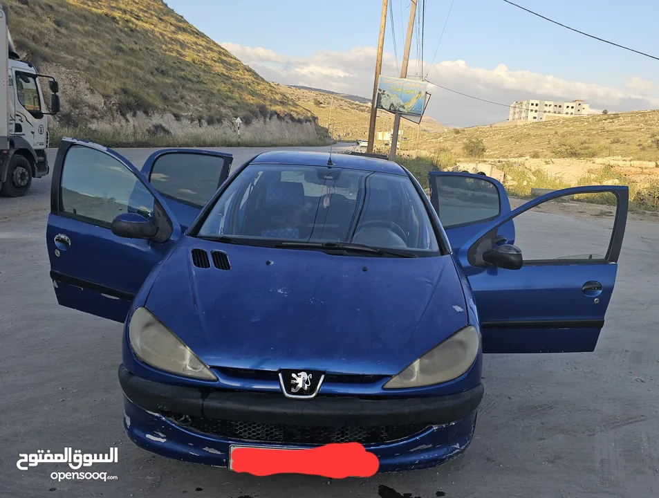 بيجو 206 ..2006 ..جير عادي ..بنزين  ماتور 1400