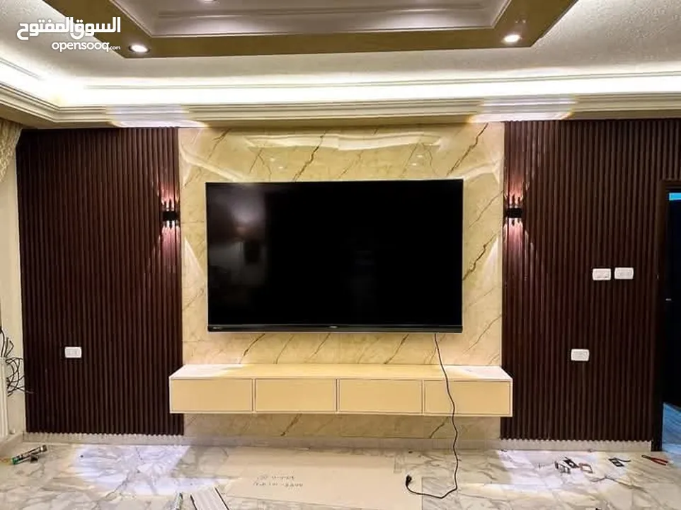 فاير بليس ورق جدران والشيبورد وبانوهات وجبسن بورد شلالات بارجولا نوافير بديل الرخام وبديل الخشب والق