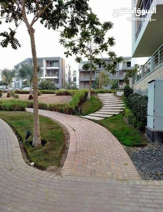 شقة للبيع بجوار سيتي سنتر الماظة في تاج سيتي علي طريق السويس - Taj City New Cairo