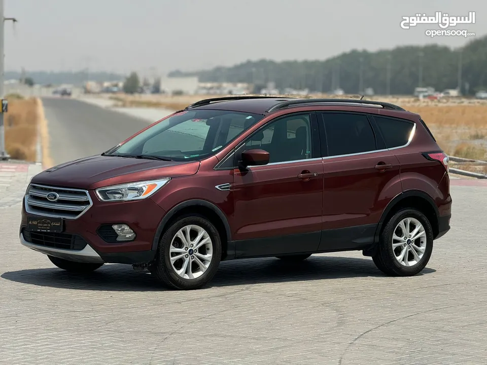 Ford Escape  / 2018 /  v4 perfect condition  / 28000 aed /