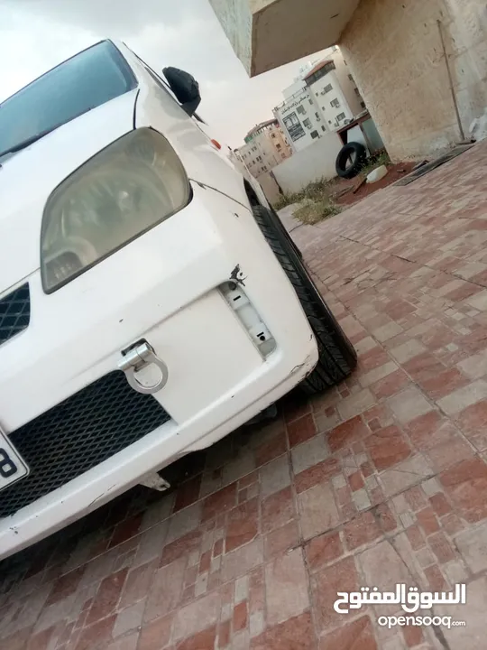 دايهاتسو شاريد 2006