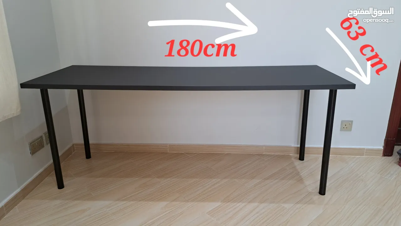 Black table. Never used