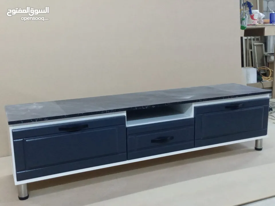 طاولات شاشه ديكورات داخلي خشب لامنيت 18م الون حسب الطلب الون حسب الطلب كفاله 5سنوات على اعمالنا