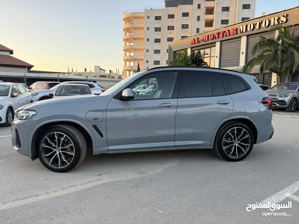 BMW x3 30e ترخيص 2022 ترخيص  محرك 2000 هايبرد plug in/يقطع على الشحنه 30 كيلو متر  293 حصان