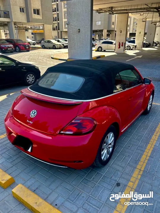 Volkswagen Beetle convertible 2018 in the royal red color , very elegant for girls and it’s ready