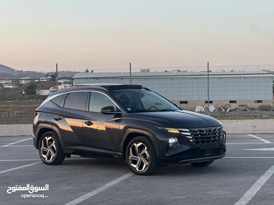 هونداي توسان/2022 Plug In فل الفل فتحة سقف بانوراما  4x4 ///271Hp   ( Haybrid) 1600cc