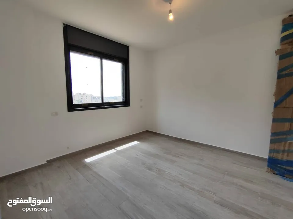 شقه فارغة للايجار في ضاحية الريحان قرب لاكاسا مول