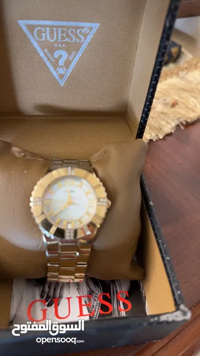 ساعه DKNY معدني برونز بحاله الجديده للبيع