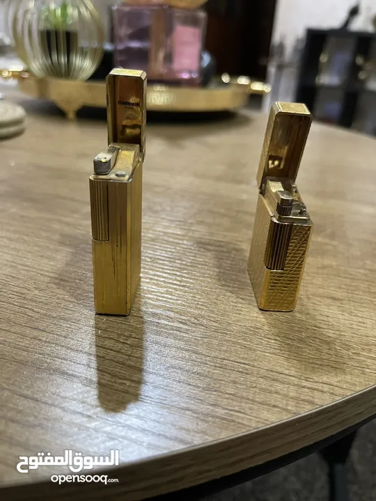 ولاعتين ديبونت ( s t Dupont )صناعه فرنسيه مطلي بالذهب