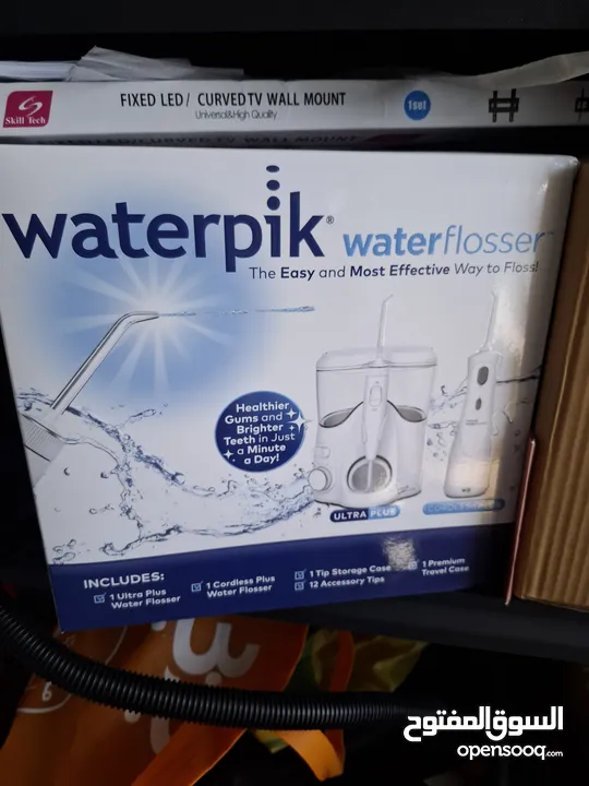 Waterpick cabled and portable for oral hygiene