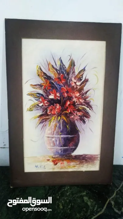 لوحات  رسم زيتي.. وتطريز