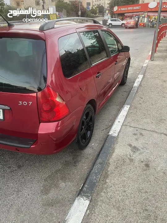 بيجو 307 2005  مطور2000 100% مكنيكيات الف الف دهان جديد مزجان حامي بارد منفوضة من النمرة ل النمرة