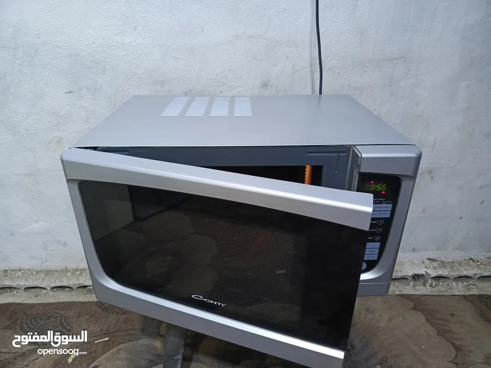 ميكرويف كونتي لون سلفر 42لتر من جوا تيفال مع نظام شواي داخليه فخم جدا تب نظافه قابل للتفاوض