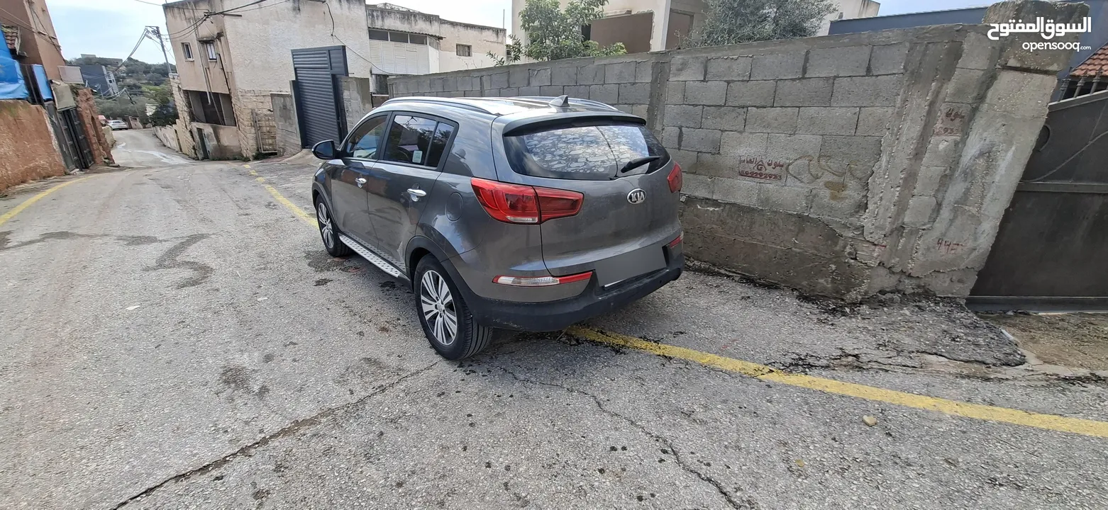 جيب كاياسبورتاج موديل 2014-اتومتيك'دفع 4×4 ماتور 2000ديزل فل فل اضافات ماعد الفتحة - نظيف من الاخر