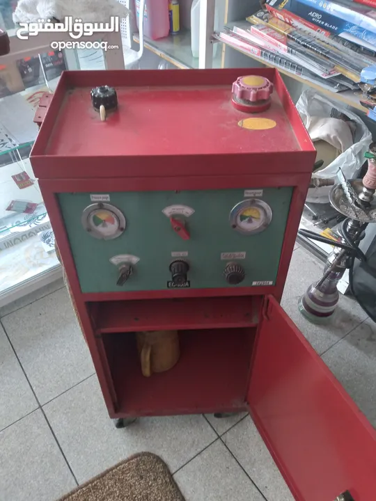 جهاز فحص سيارات  كومبيوتر وجهاز تنظيف بخاخات