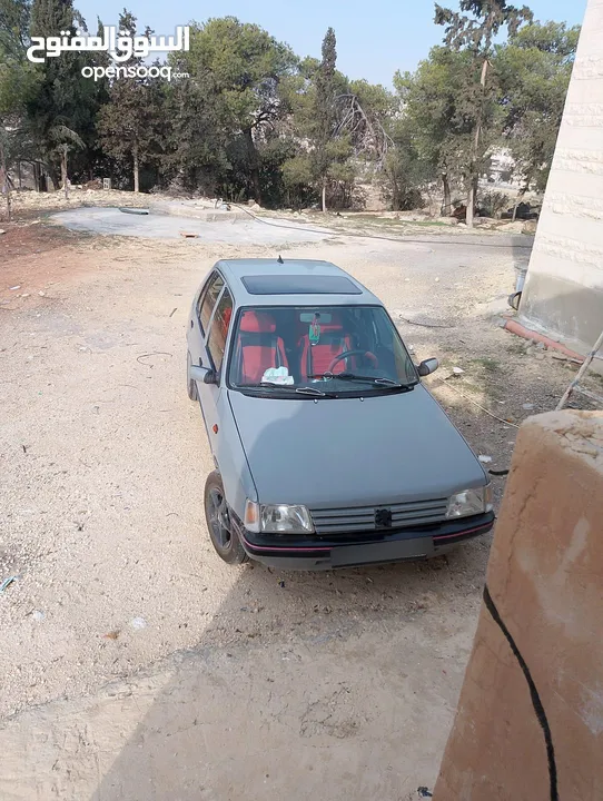 بيجو 205 للبيع السيارة جير عادي مش ناقصها برغي زي ما هي بالصور تماماً قانوني ومرخص ومأمن ساري مفعول