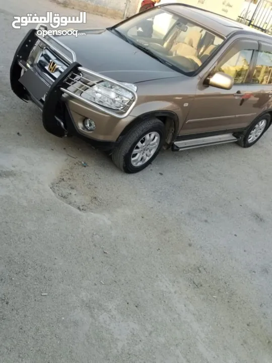 هوندا CR V فحص 2جيد خلفي وأمامي مضروب علا راس الجب بحاله ممتازه ولا بحاجه اي من الصيانه بس شعر وروح