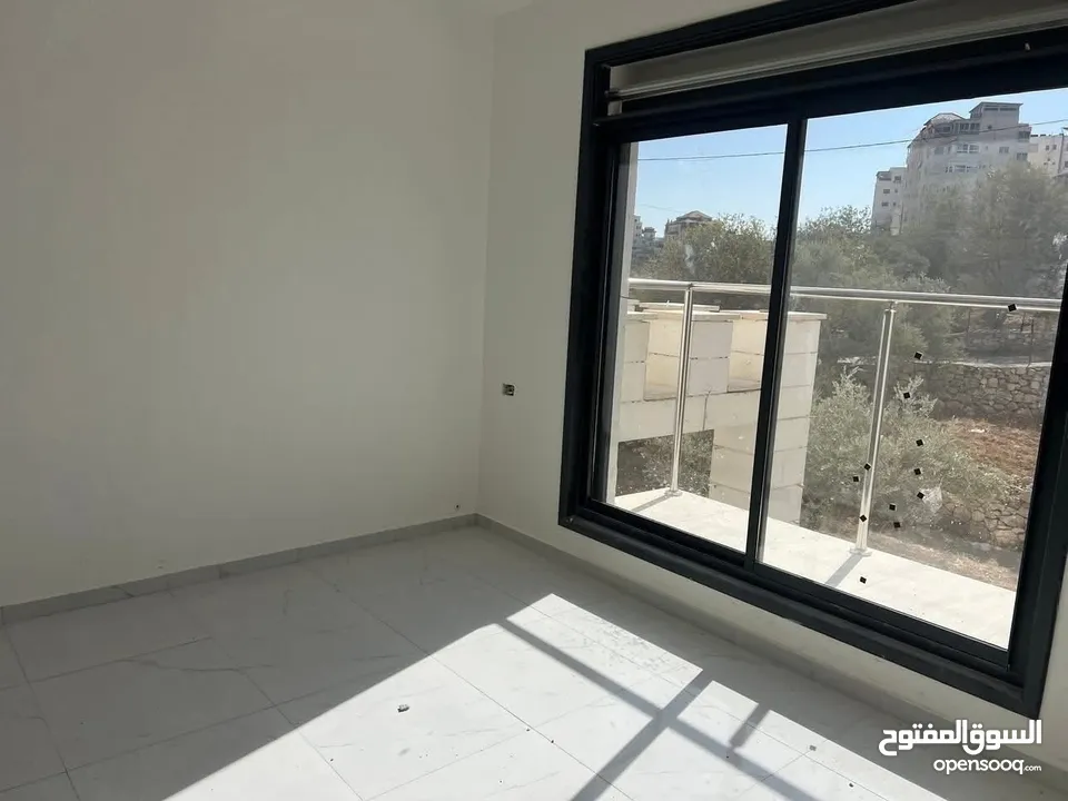 شقه للبيع في سطح مرحبا قرب ترست للتأمين