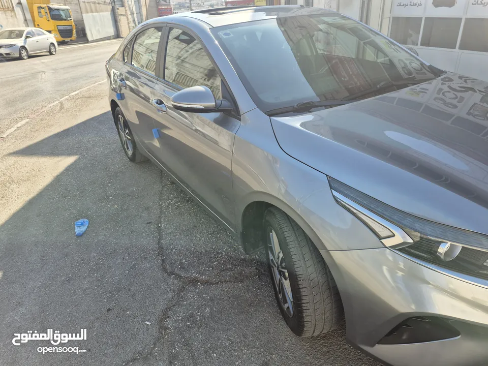 كيا سيراتو 2021 دهان شركة بوضع ممتاز جدا صالون بالنايلون بحالة الشركة .