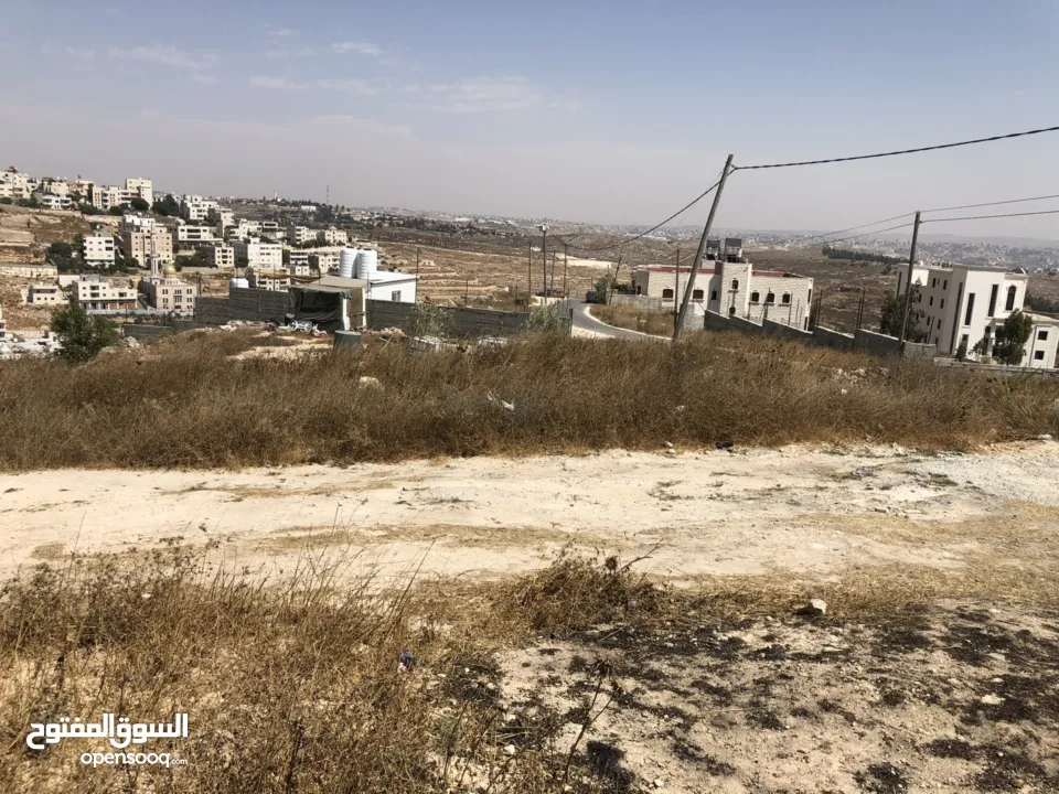 للبيع قطعة أرض طابو 881 م في سنجر/ خلة مناع الحي الغربي مطلة و كاشفة