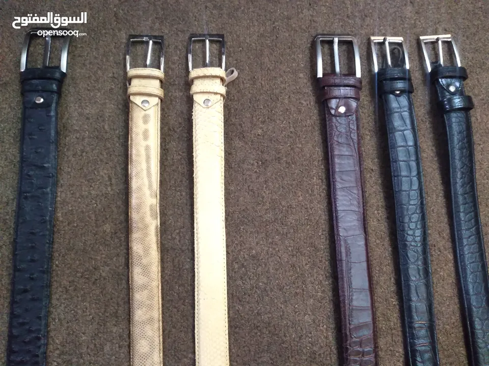 محافظ وأحزمة من جلد الثعبان و التمساح و النعام