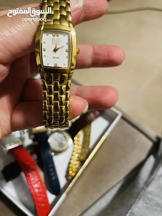 ساعة إليز سويسرية جديدة مطلية ذهب بفصوص داخلية ألماظ
