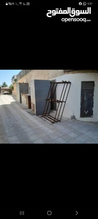 والشبابيك والابواب والحمايه والمواسير والنحاس والالمنيوم تنزيل تنكات . عن الاسطحه وقصها تنظيف اسطح ت