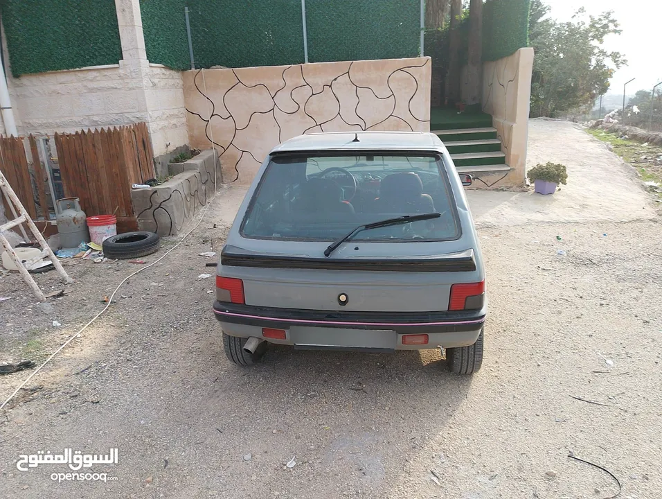 بيجو 205 للبيع السيارة جير عادي مش ناقصها برغي زي ما هي بالصور تماماً قانوني ومرخص ومأمن ساري مفعول