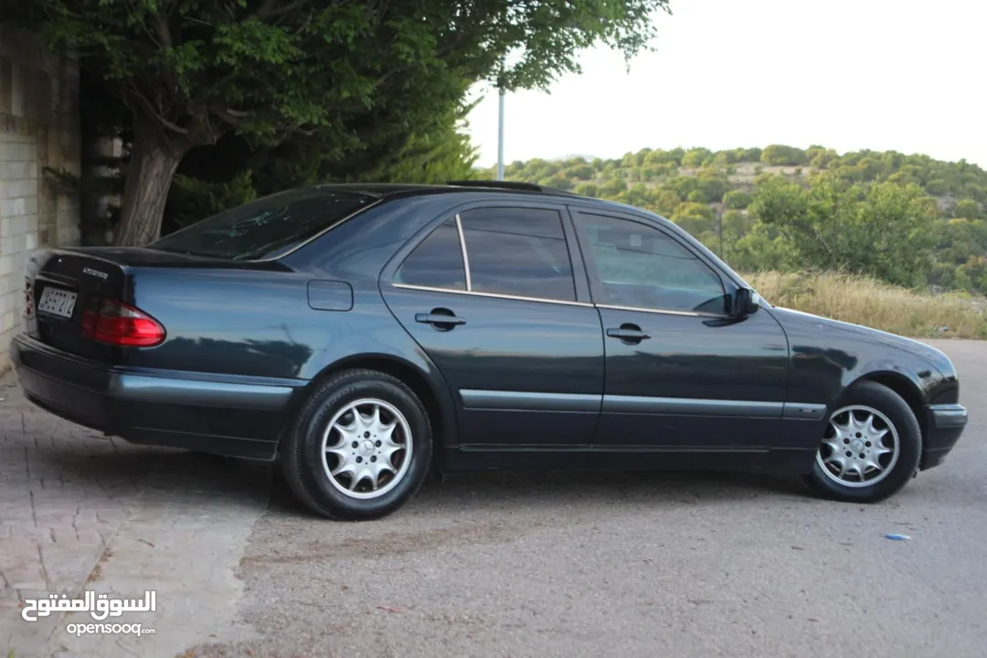 E200. 2002  قرش ونص 2002  رقم الهاتف بالوصف